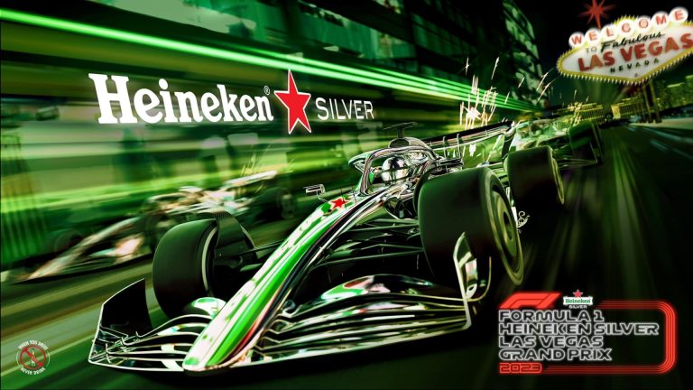 Heineken Silver logo with green car driving past "Welcome to Las Vegas" Sign