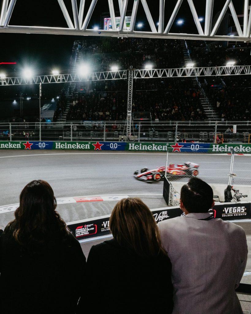 people watching cars turning into turn 1